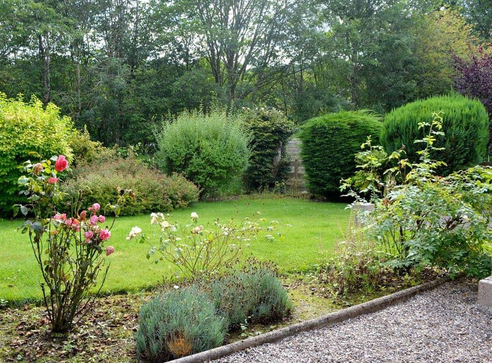 Lawned garden at Ferry Cottage in Pitlochry, Perthshire