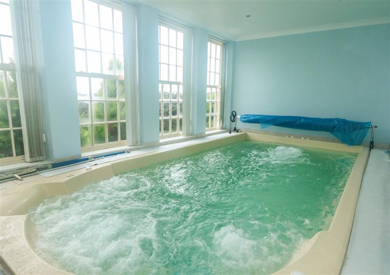 Enjoy the swimming pool at Ferry Farm House, Ten Mile Bank near Southery