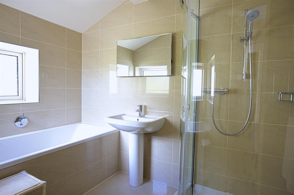 Elegant, fully tiled family bathroom at Ferryside in East Portlemouth, Salcombe