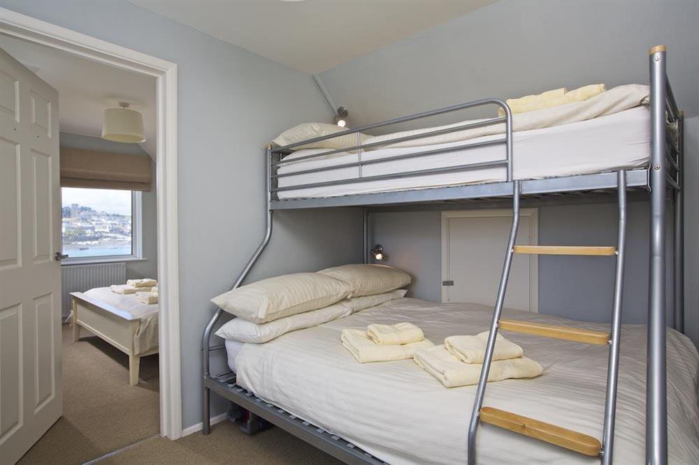 Family suite with bunk beds leading through to double bedroom at Ferryside in East Portlemouth, Salcombe