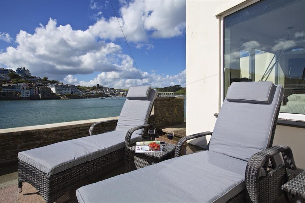 Sunny terrace with loungers at Ferryside in East Portlemouth, Salcombe