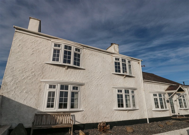 The setting of Fferm Porthdafarch South Farm House