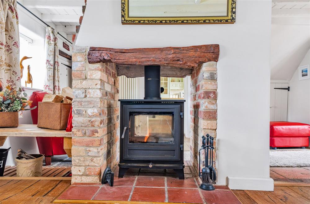 The double-sided wood burning stove provides a great focal point