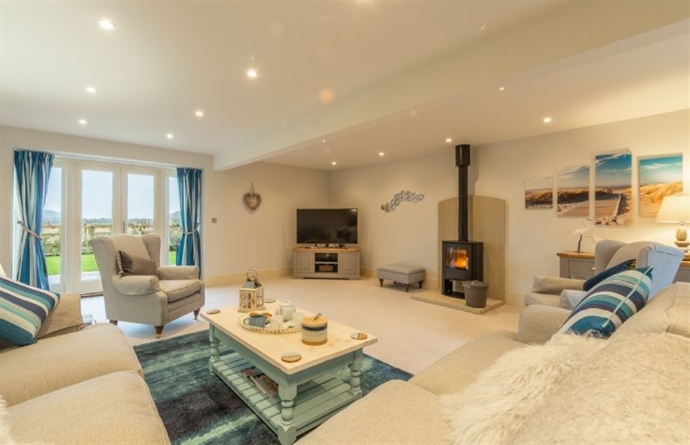 Sumptuous sitting room with wood burning stove (photo 2) at Field Corner, Docking
