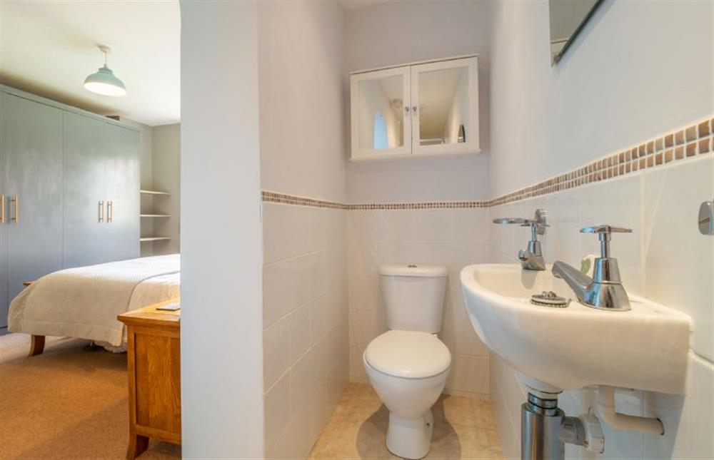 En-suite shower room with shower cubicle, wash basin and WC at Field End, Westleton