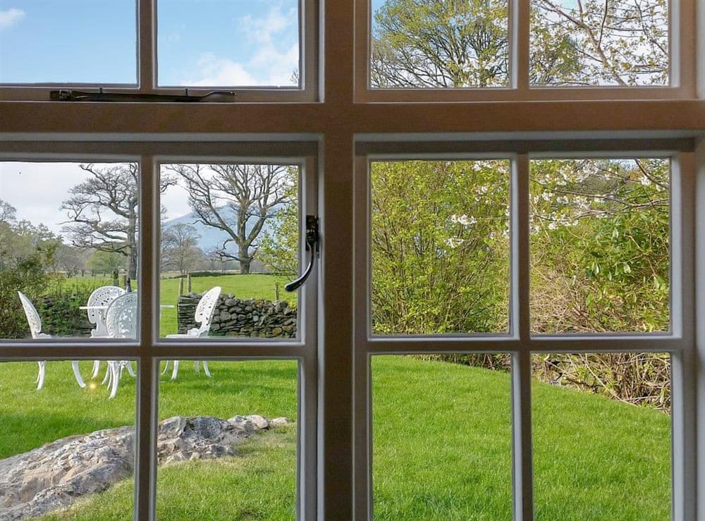 Garden views from the bedroom at Field House Lodge in Grange-in-Borrowdale, near Keswick, Cumbria