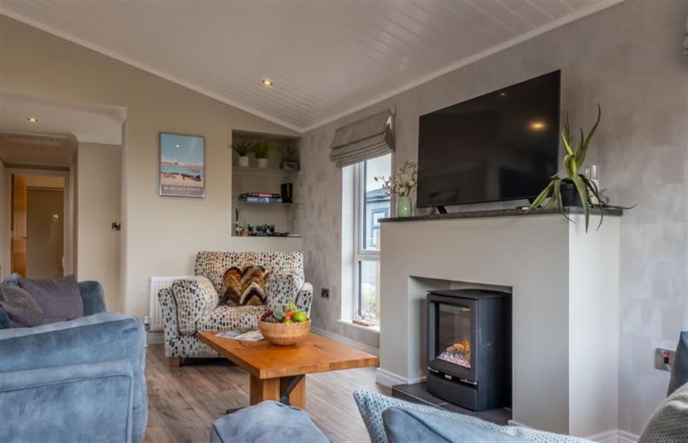 Ground floor: Cosy up by the fire at Field Lodge, Burnham Market near Kings Lynn