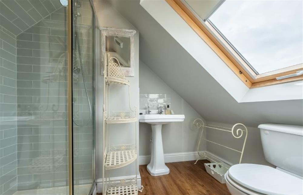 Bedroom four boasts an en-suite shower room at Field Piece Cottage, Burnham Market
