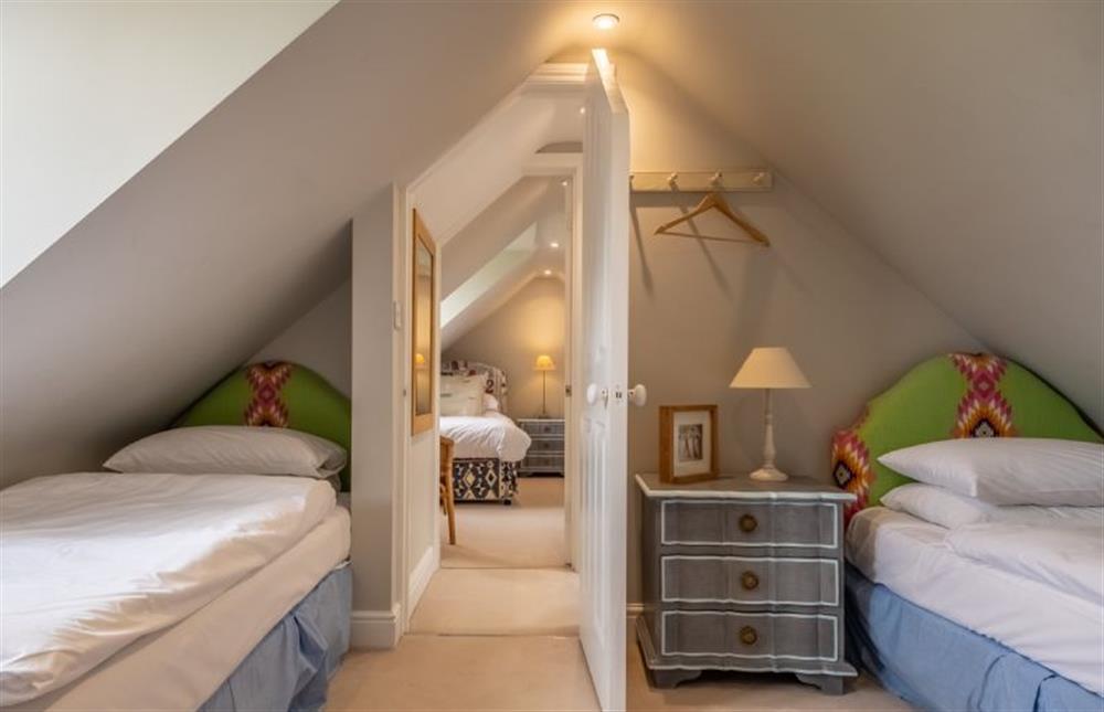 Bedroom four on the second floor with twin 3’ single beds at Field Piece Cottage, Burnham Market