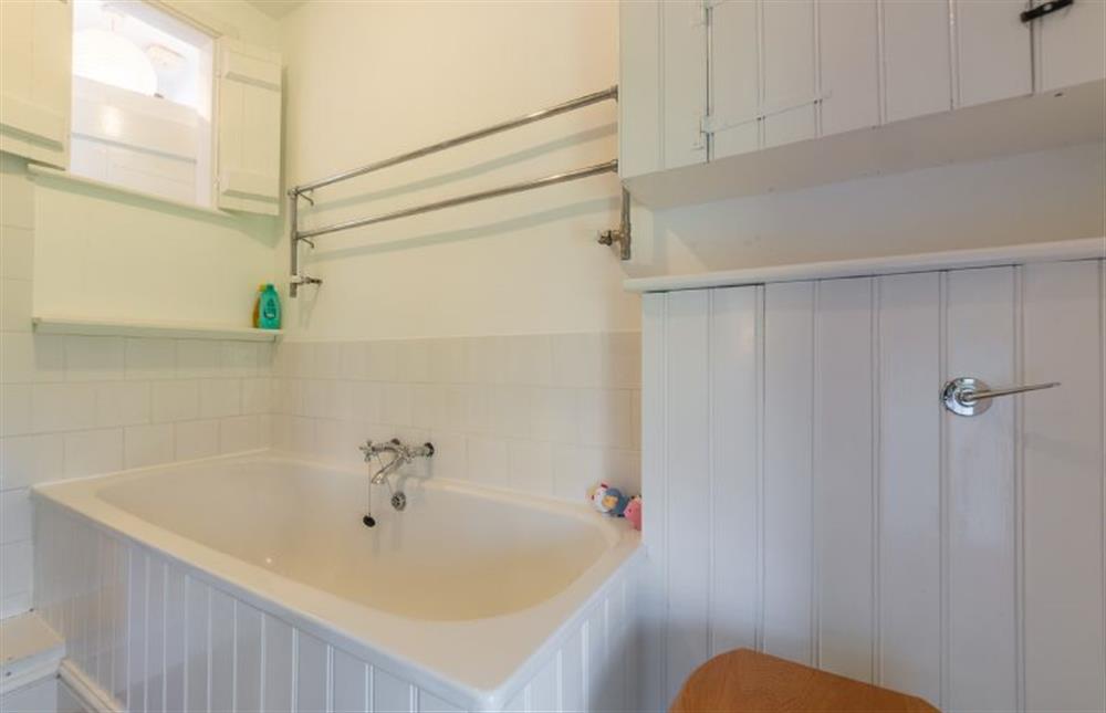First floor: The en-suite has a bath and separate shower cubicle at Field Row, Field Dalling near Holt
