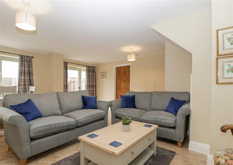 Relax in the living area at Field View Cottage, Bourton-On-The-Water