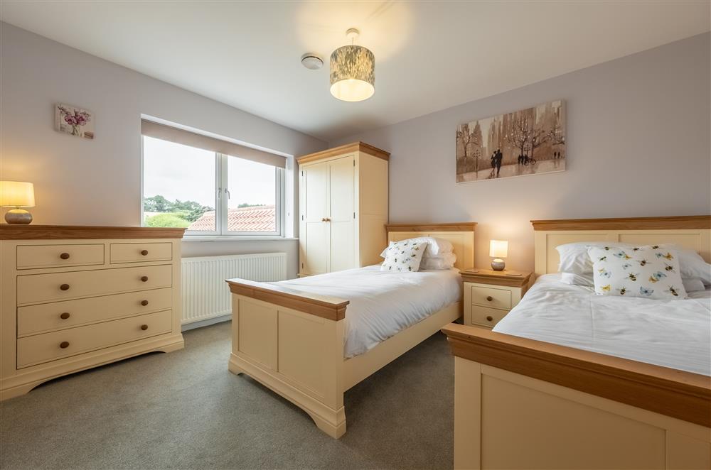 Bedroom four on the first floor with 3’ twin single beds at Field View, Sedgeford