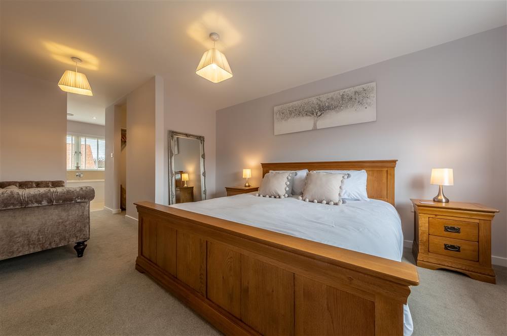 Bedroom two on the first floor with a 6’ super-king size bed and en-suite at Field View, Sedgeford