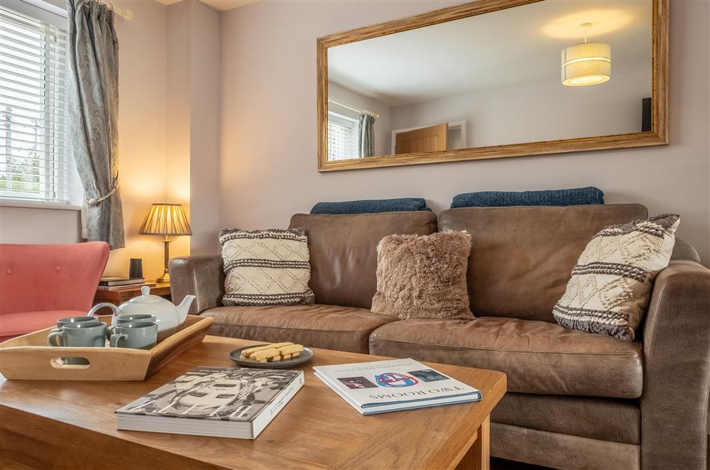 Enjoy the seating by the window looking out to the front of the property from the sitting room at Field View, Sedgeford