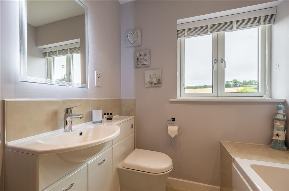 Family bathroom with countryside views at Field View, Sedgeford