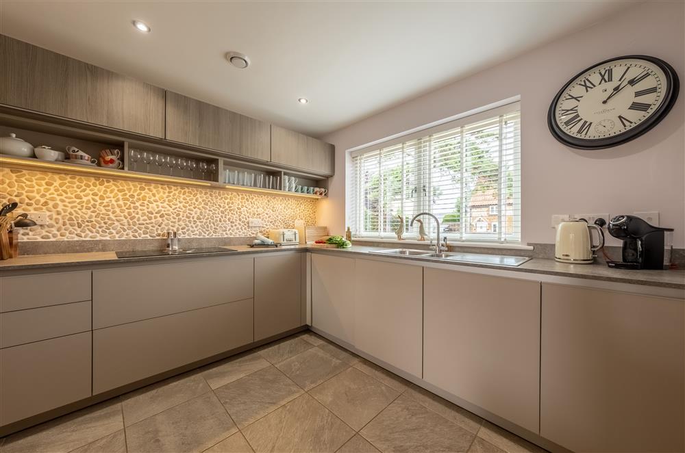 Well-equipped kitchen with a Neff electric hob and Nespresso Dolce Gusto coffee machine at Field View, Sedgeford