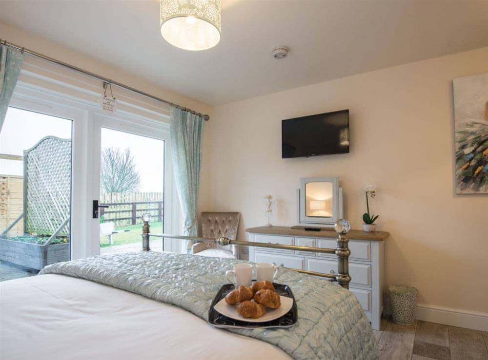 Relaxing double bedroom with TV (photo 2) at Field View in Wainfleet St. Mary, near Skegness, Lincolnshire