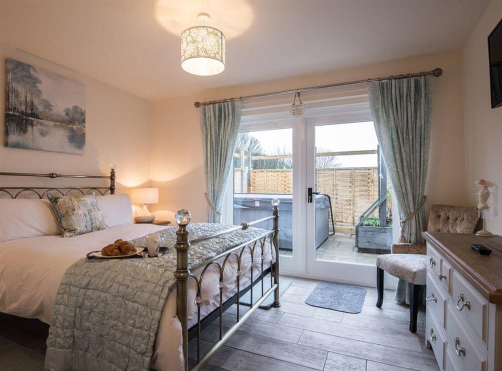 Relaxing double bedroom with TV at Field View in Wainfleet St. Mary, near Skegness, Lincolnshire