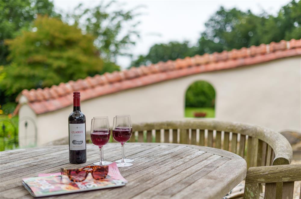 A perfect spot for enjoying alfresco dining with a glass of wine at Fig and Bay Cottage, Axminster