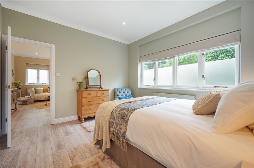 Bedroom one, located on the ground floor at Fig and Bay Cottage, Axminster