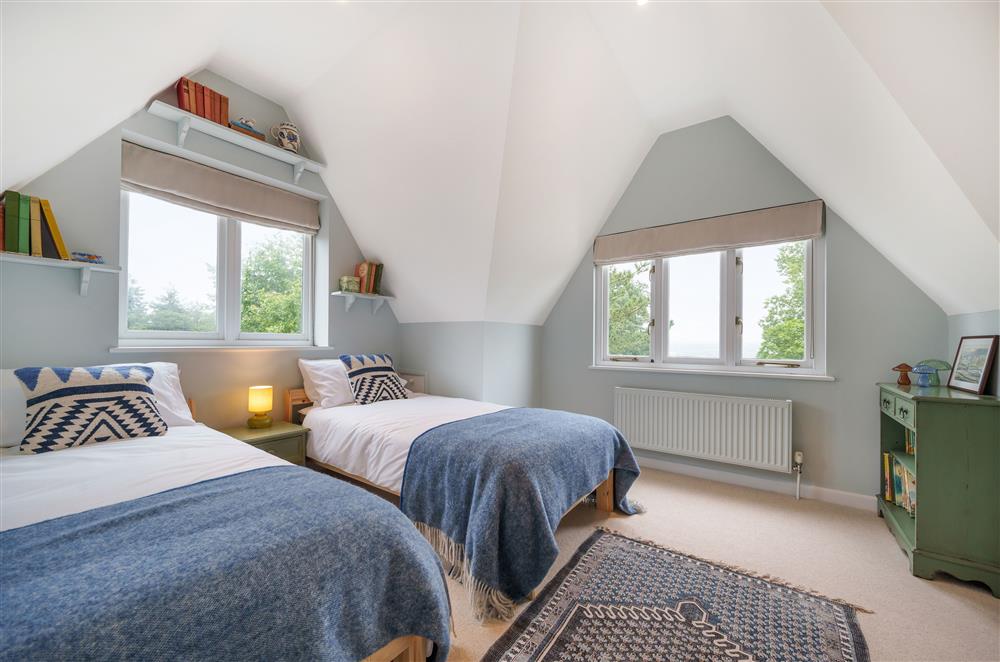 Bedroom two affords beautiful rural views across the surrounding countryside at Fig and Bay Cottage, Axminster