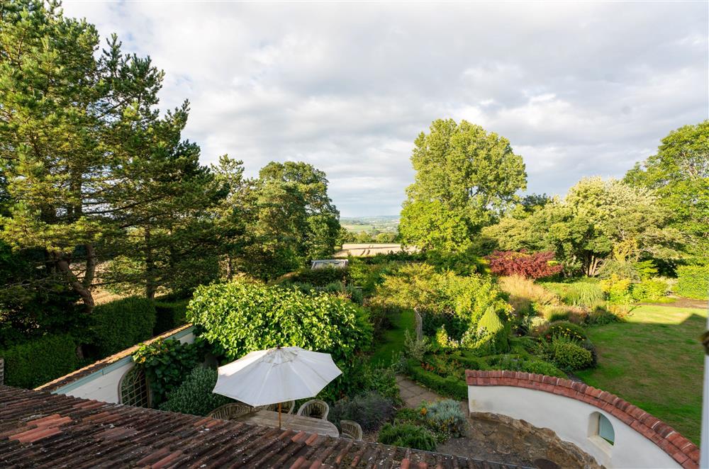 Surrounded by beautiful gardens and far reaching views of the countryside at Fig and Bay Cottage, Axminster
