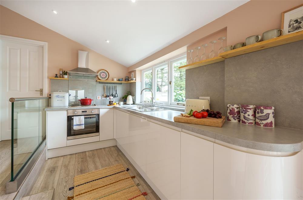 The well-equipped kitchen area  at Fig and Bay Cottage, Axminster