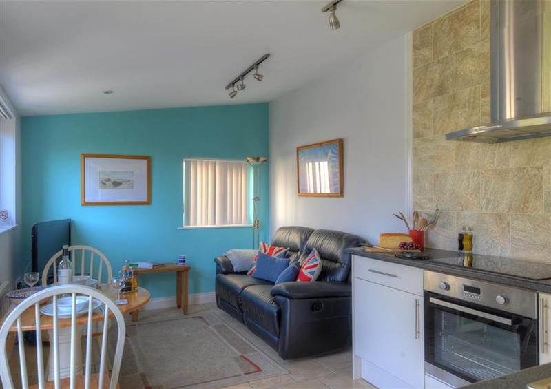 Relax in the living area at Fig Tree Cottage, Lyme Regis