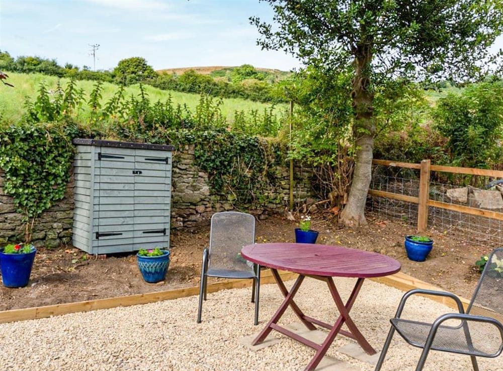 Sitting-out-area at Fig Tree Shepherds Hut in Bridport, Dorset