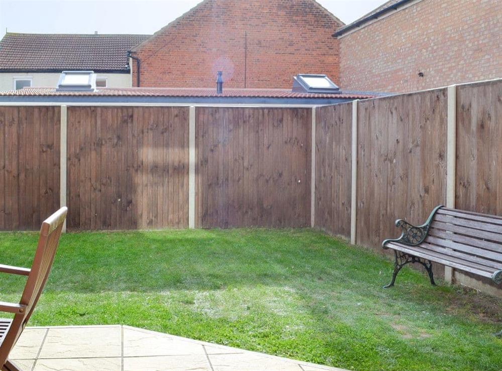 Enclosed rear garden and patio at Filey House in Sheringham, Norfolk
