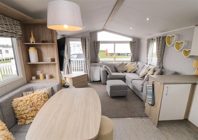 Relax in the living area at Finch 47, Cayton