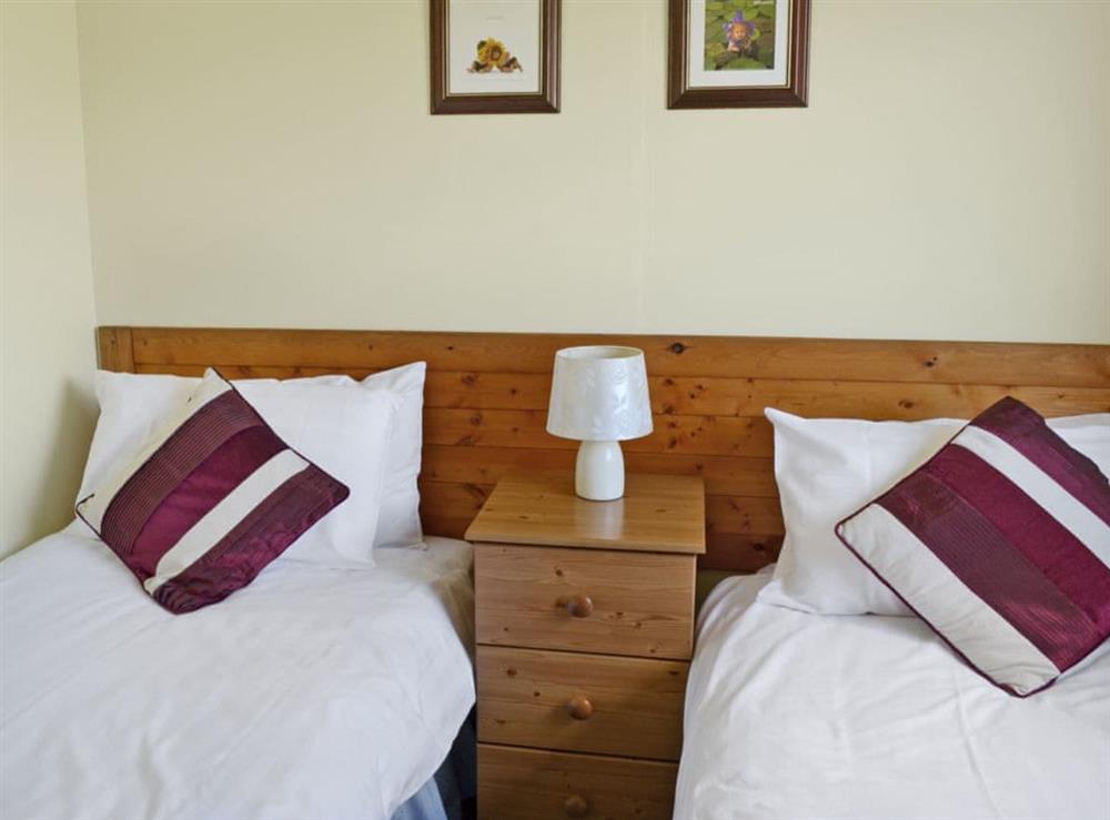 Twin bedroom at Finch Lodge in York, North Yorkshire