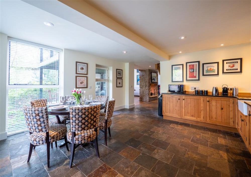 Large country-style kitchen with door to decked terrace at Fingle Bridge in Chagford