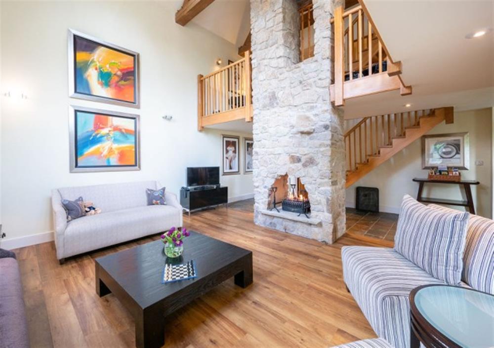 Open sitting room with characterful features at Fingle Bridge in Chagford