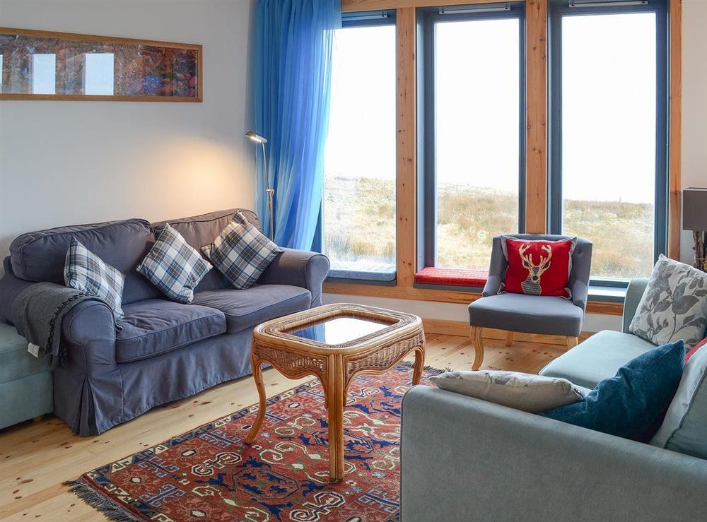Spacious open plan living area at Fionn Croft Lodge in Gairloch, Ross-Shire