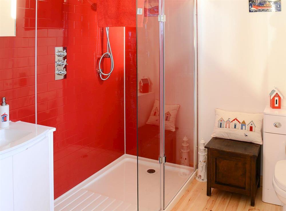 The en-suite boasts a full height walk-in shower at Fionn Croft Lodge in Gairloch, Ross-Shire