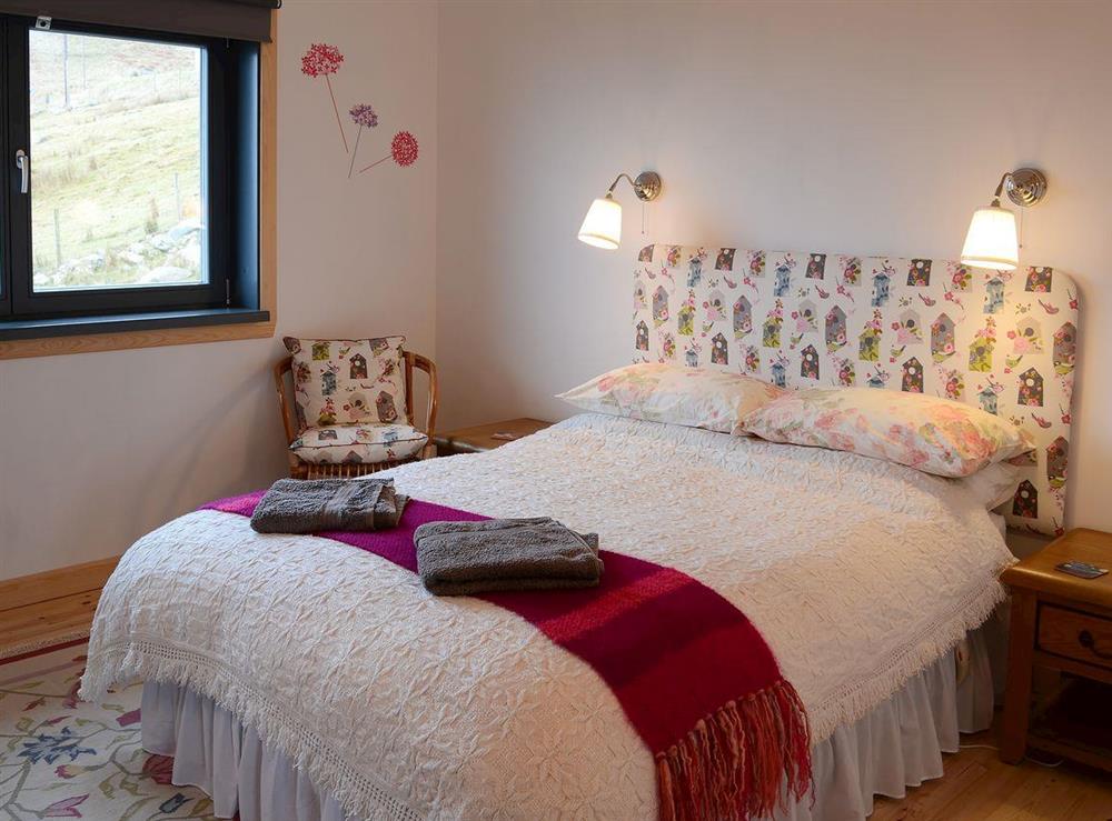 Warm and welcoming double bedroom at Fionn Croft Lodge in Gairloch, Ross-Shire
