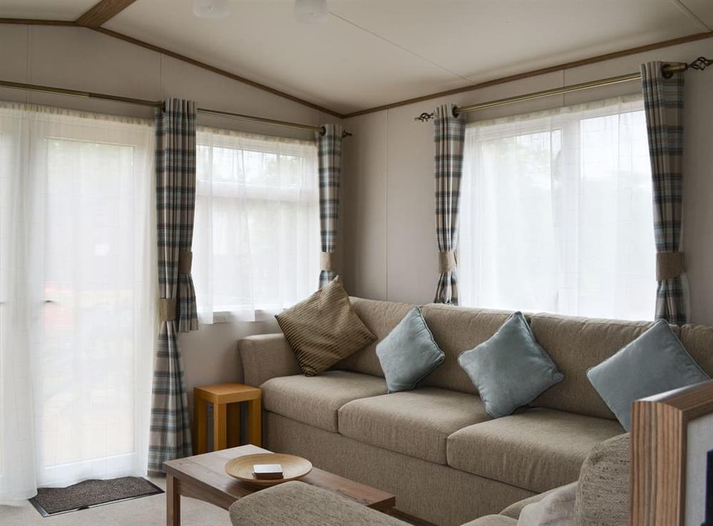 Cosy living space at Fir Tree Lodge in Aviemore, Highlands, Inverness-Shire