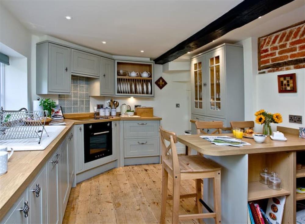 Wonderful kitchen with breakfast area at Firestone Lodge in , Wootton