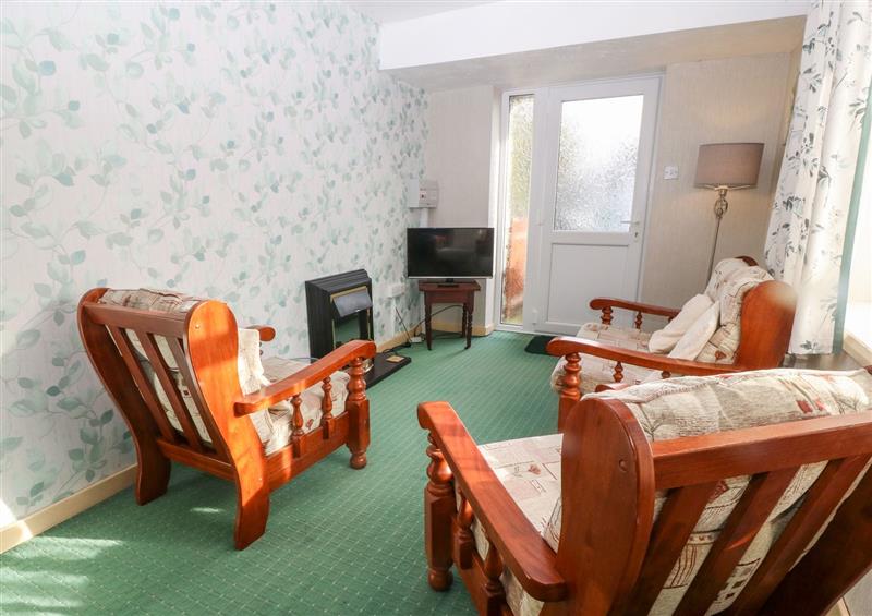 This is the living room at First Floor Apartment, Tremadog