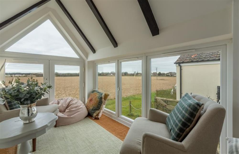 First floor:  The delightful reading room with open countryside views at First & Last, Trimingham near Norwich
