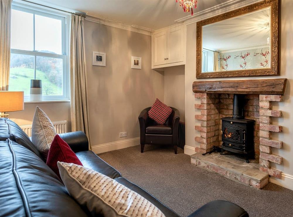 Cosy snug with wood burner at Fisher Place in Thirlmere, near Keswick, Cumbria