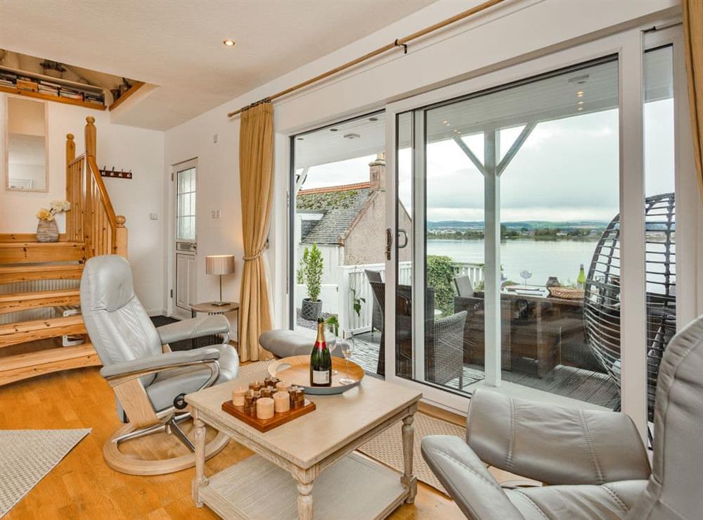 Open plan living space at Fishermans Cottage in Kessock, Inverness, Inverness-Shire