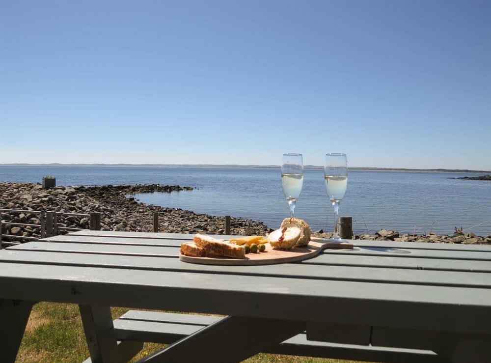 Outdoor furniture with amazing views at Fishermans Cottage in Newton Stewart, Wigtownshire