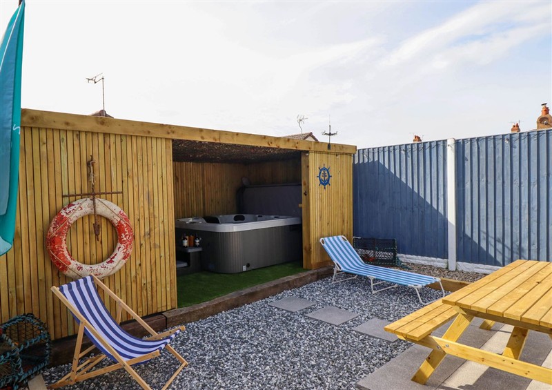 Enjoy the swimming pool at Fishermans Cottage, Prestatyn