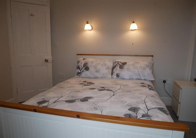 A bedroom in Fisherman's Cottage (photo 2) at Fishermans Cottage, Southwell