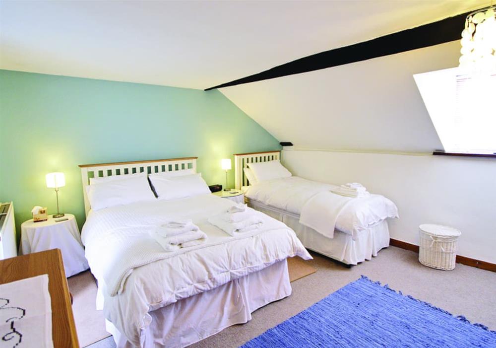 Fisherman’s Cottage double bedroom with single bed at Fishermans Cottage in Wells-Next-The-Sea, Norfolk