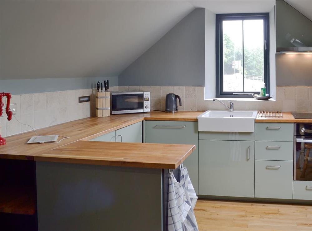 Well equipped kitchen area at Fishermans Lodge in Alderwasley, near Matlock, Derbyshire