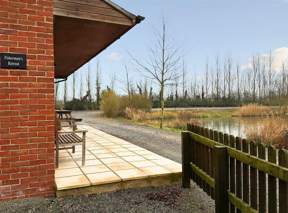Relax on the patio and watch the wildlife on the well-stocked fishing lake on your doorstep