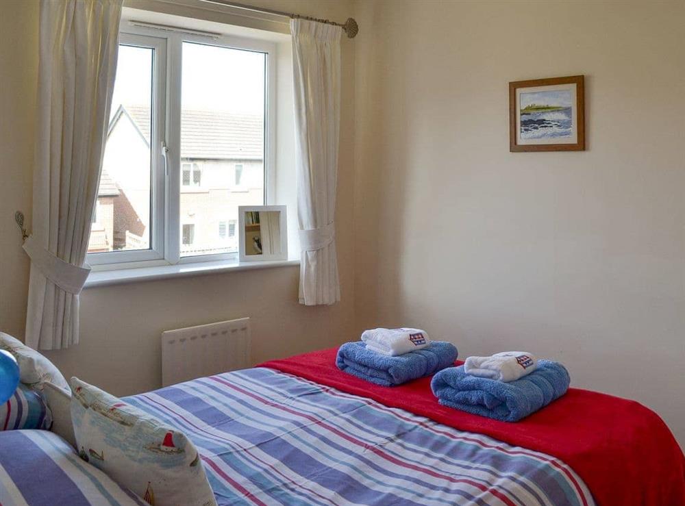 Comfortable double bedroom at Fishers Cottage in Seahouses, Northumberland